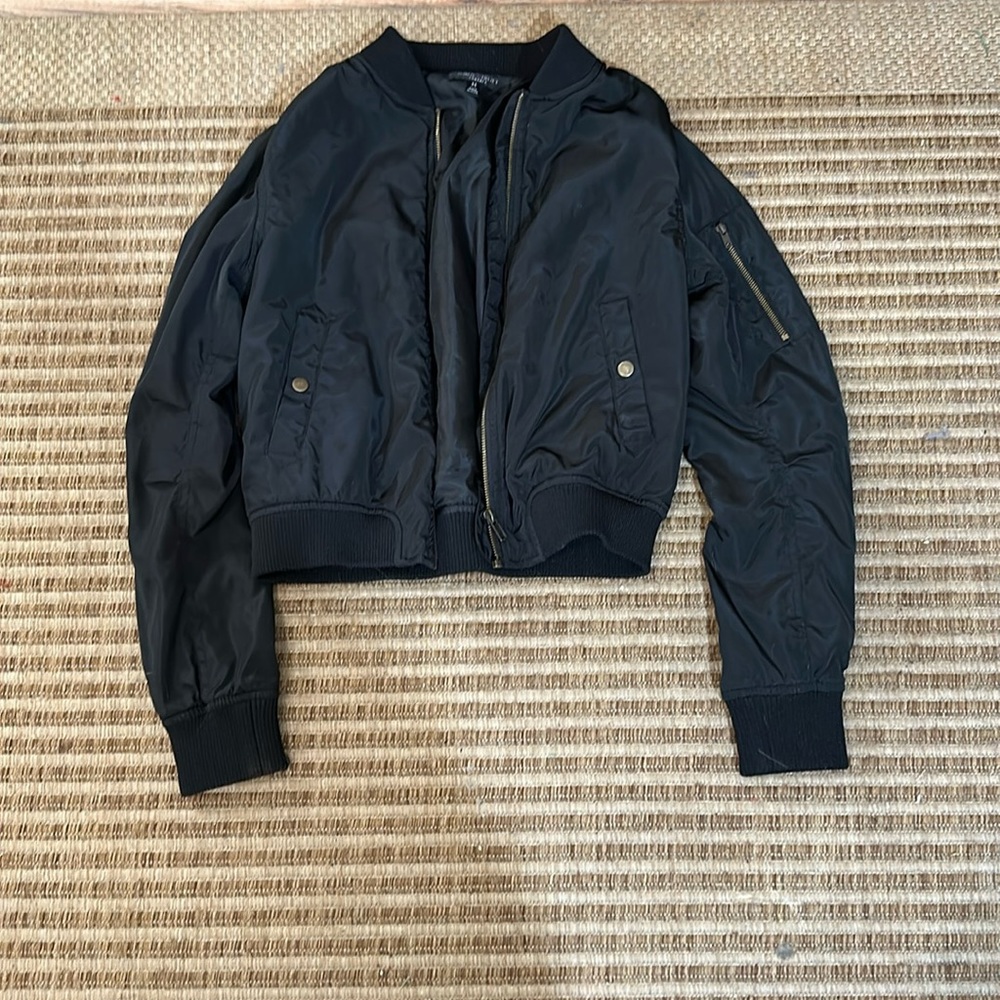 I am selling a black kids jacket size medium the brand is Romeo +Juliet couture